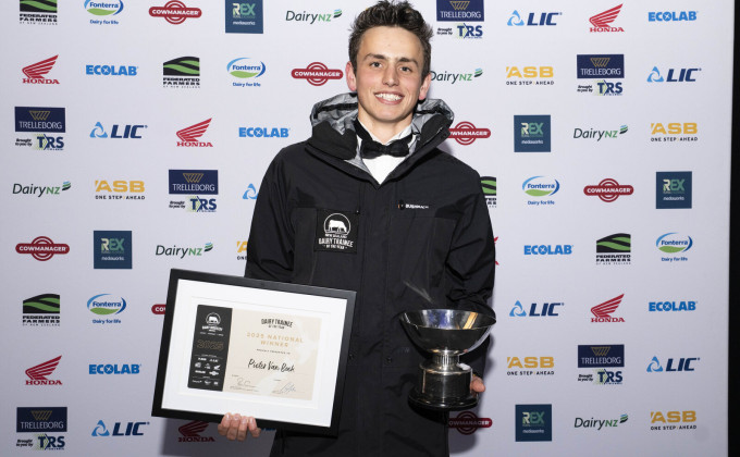 Pieter with the Dairy Trainee of the Year Award and trophy